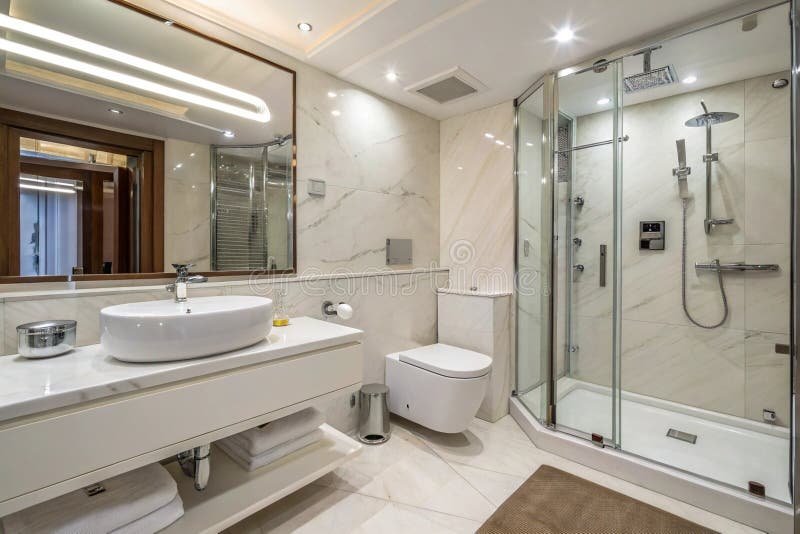 Kuuluuko Bidee-Suihku Taloyhtiön Yhteisiin Tilojen 1 moderni bidee suihku kylpyhuoneessa taloyhtiossa