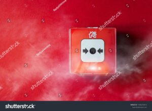 palohalytin seinalla savua taustalla